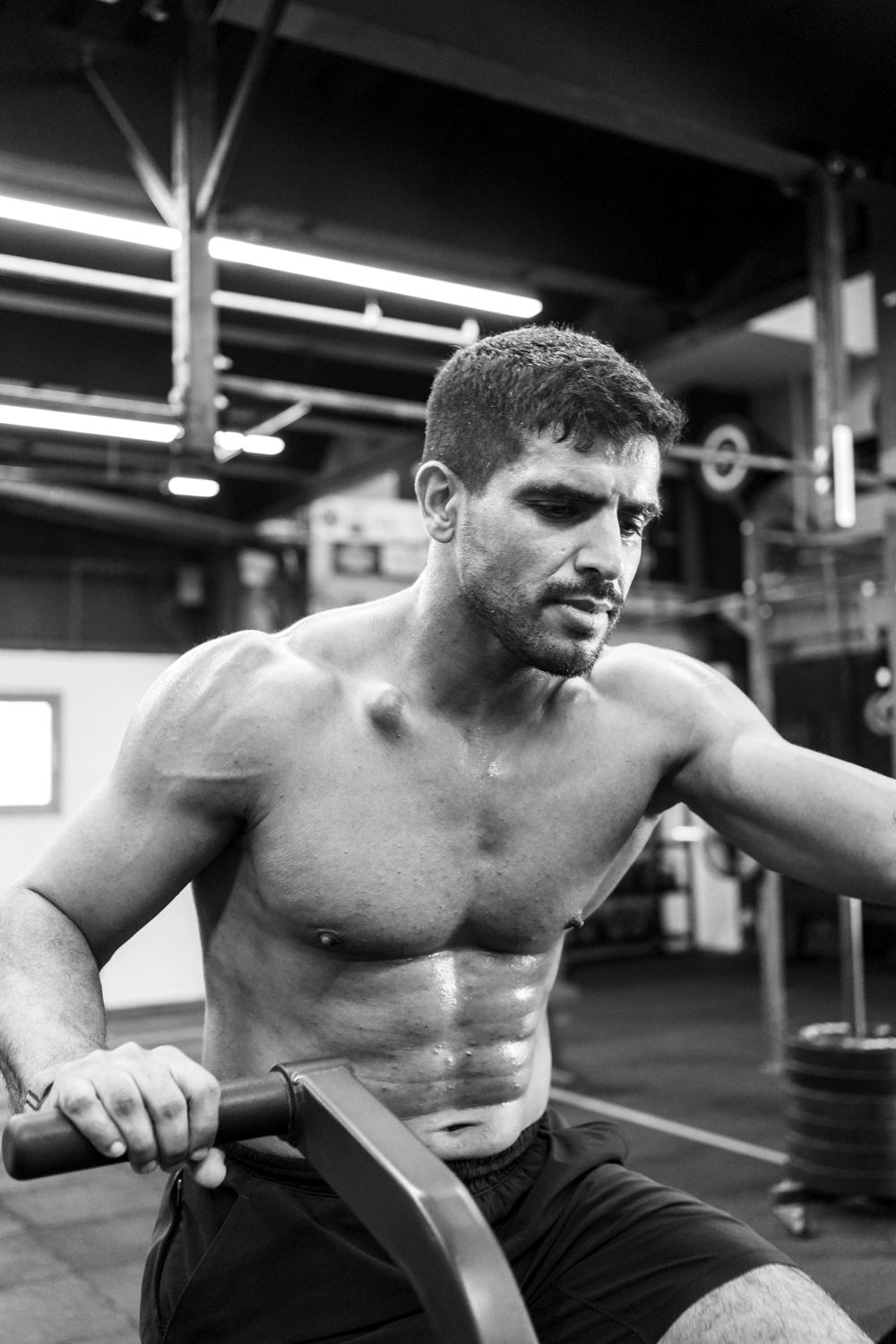 Athlete pushing hard on the rower